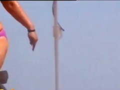 Plump mature beach topless