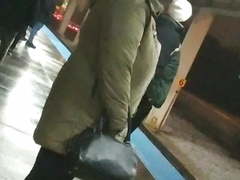 Now can you tell she is hiding huge tits underneath coat??